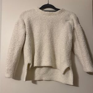 White fuzzy sweater